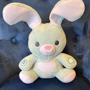 This is a BabyBibi or WinFun Peekaboo Light Up Bunny interactive plush toy.